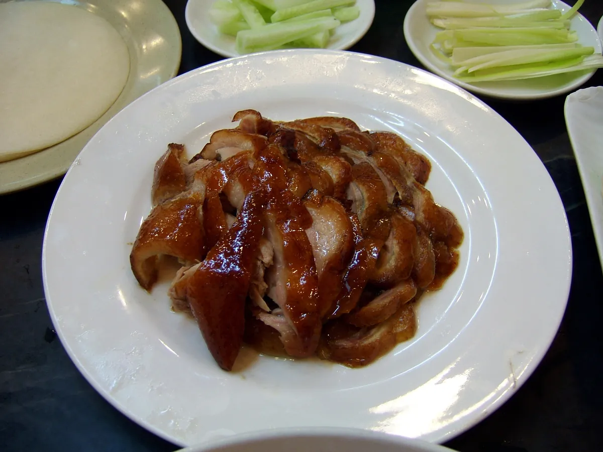 Sliced Peking duck served with thin pancakes