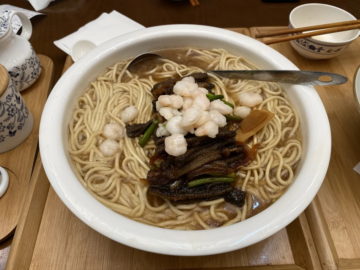 Hangzhou noodles topped with shrimp and eel