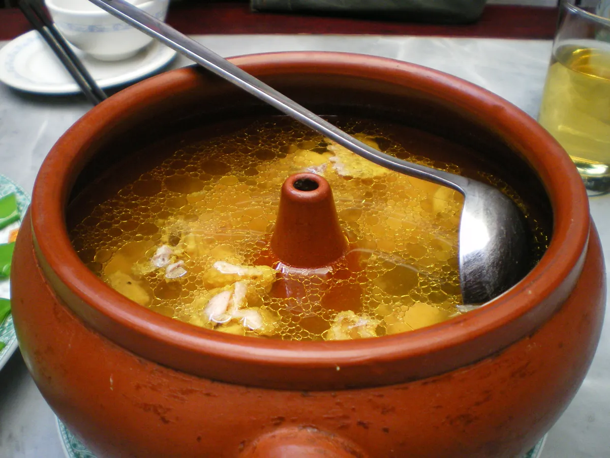Yunnan steam-pot chicken in its clay cooking vessel