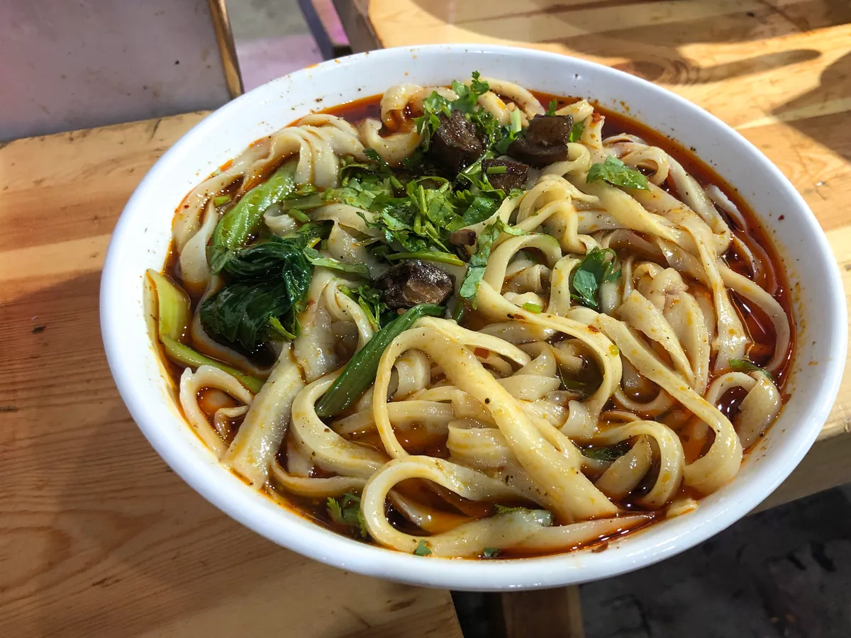 Shanxi knife-cut noodles topped with savory sauce